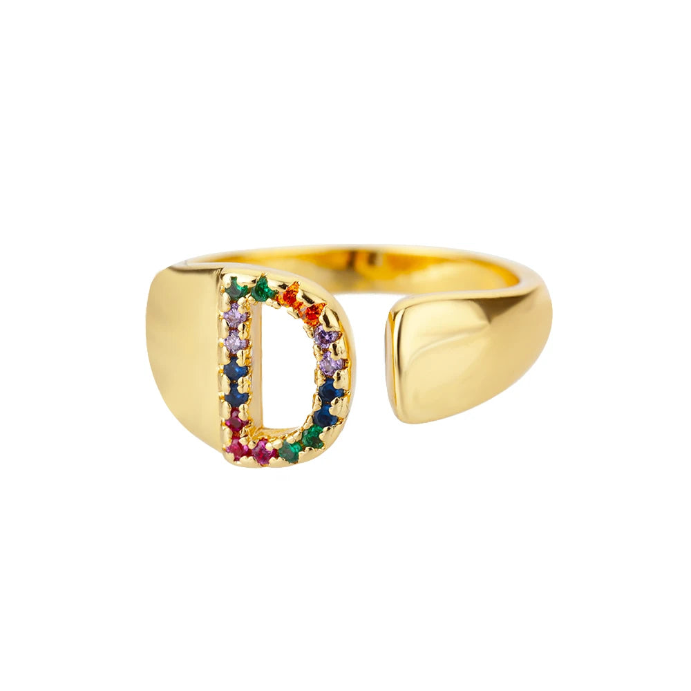 Anillos de letras con circonita arcoíris