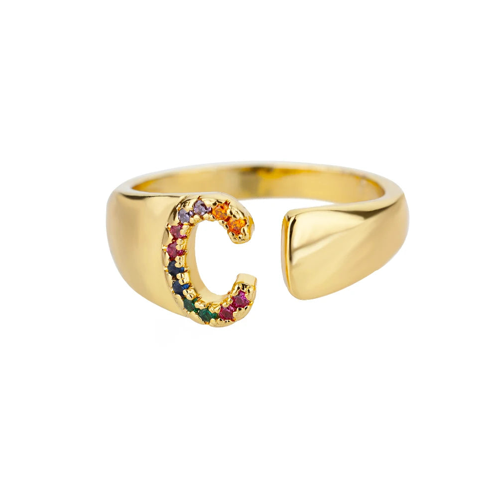 Anillos de letras con circonita arcoíris