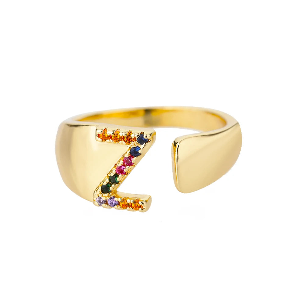 Anillos de letras con circonita arcoíris