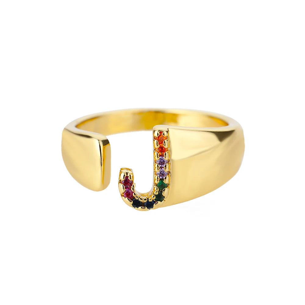Anillos de letras con circonita arcoíris