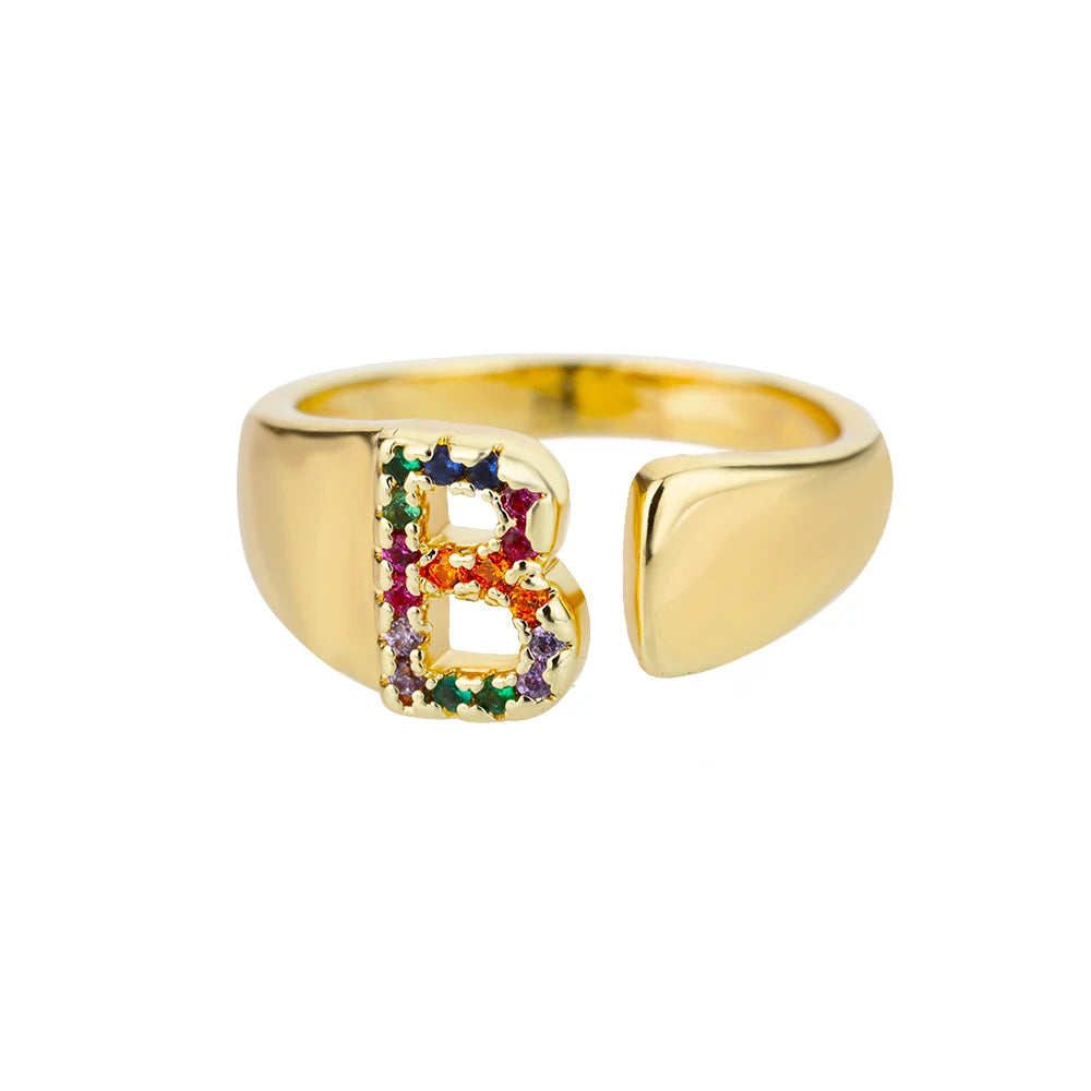 Anillos de letras con circonita arcoíris