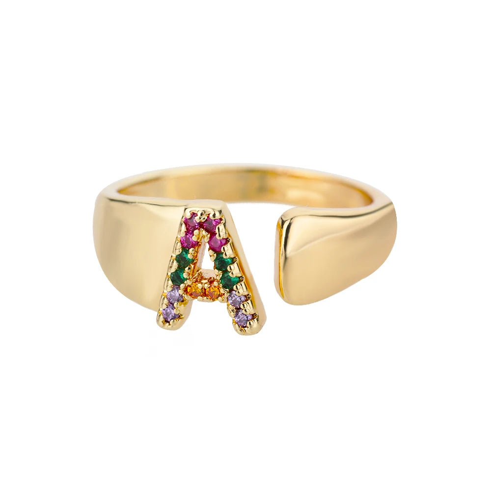 Anillos de letras con circonita arcoíris