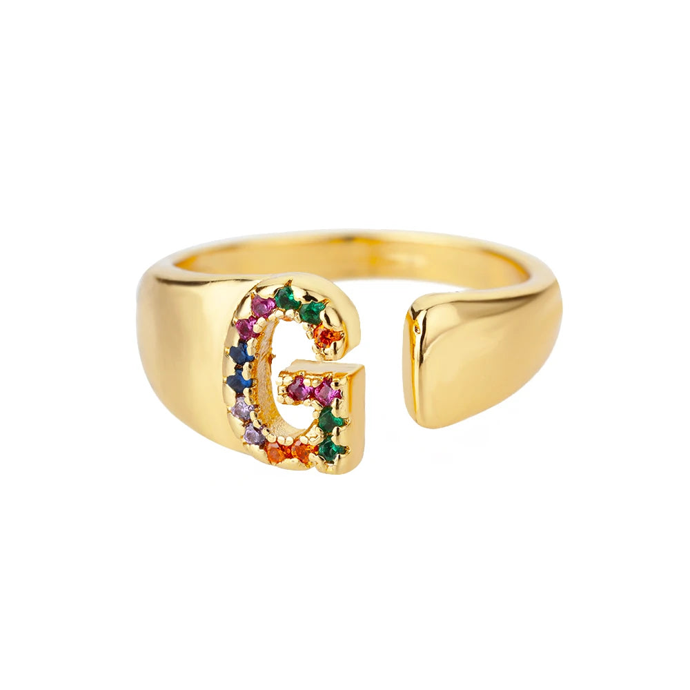 Anillos de letras con circonita arcoíris