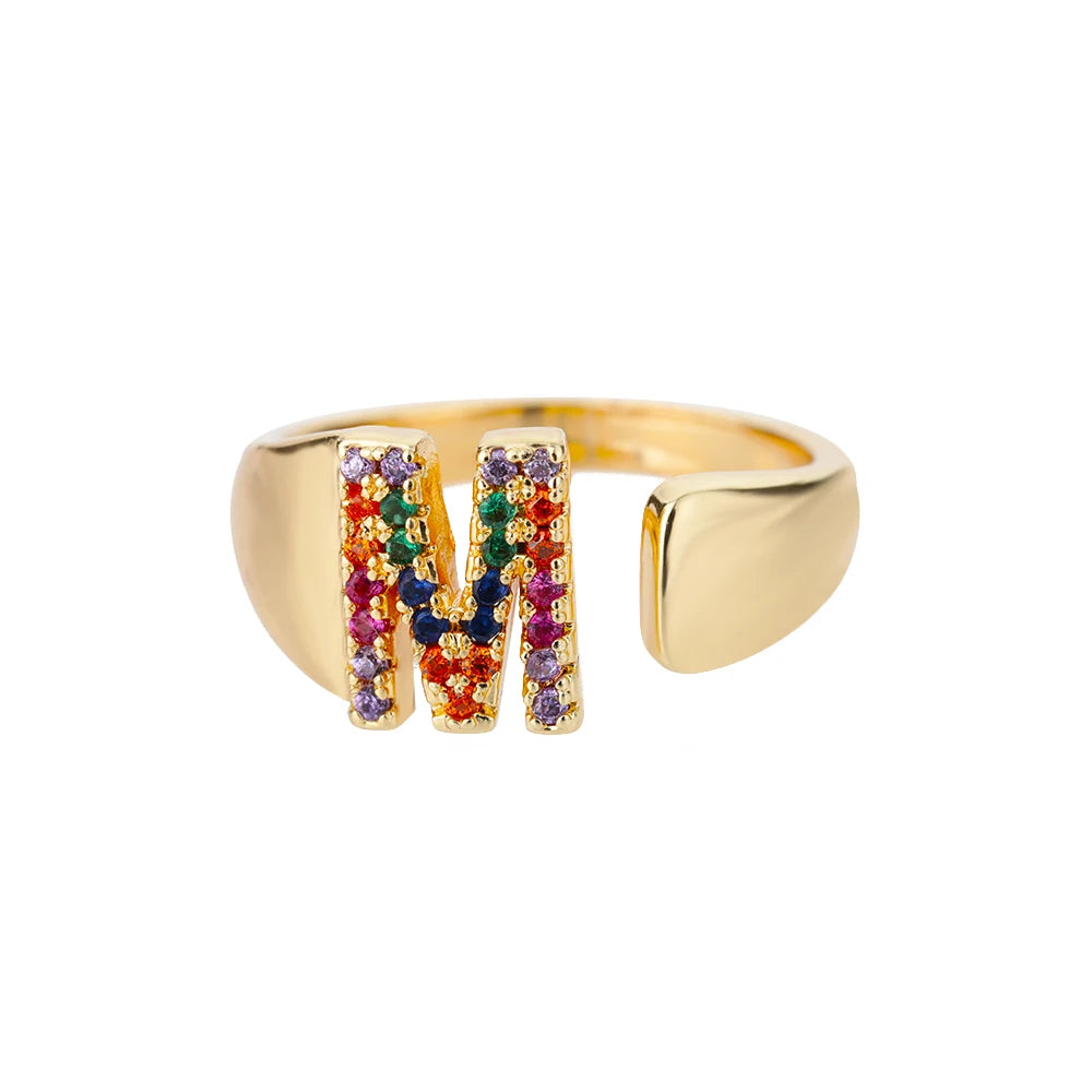 Anillos de letras con circonita arcoíris