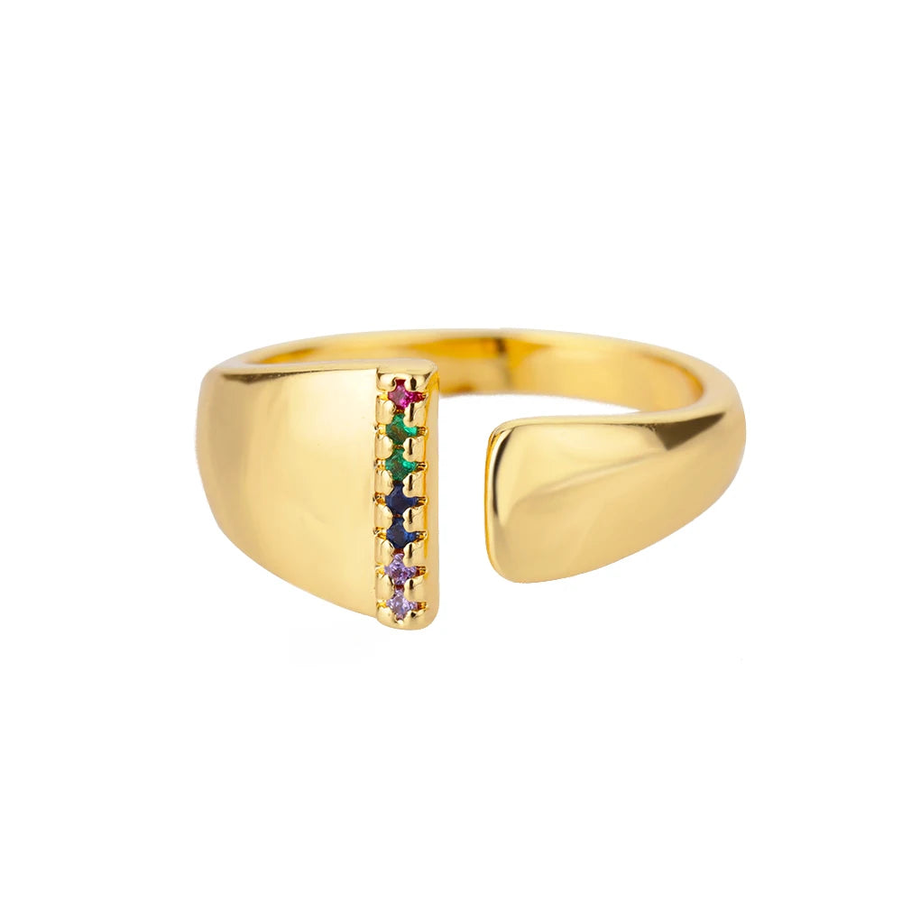 Anillos de letras con circonita arcoíris